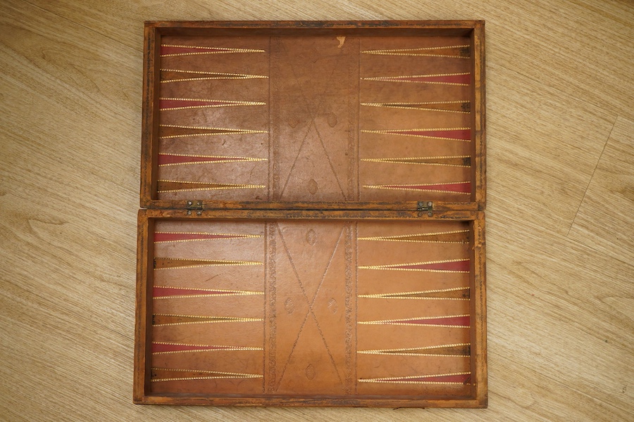 Three late 19th/early 20th century folding chess/backgammon boards fashioned as books